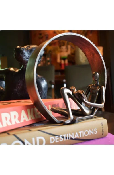 Kinetic Encircled Reader Sculpture In Pewter