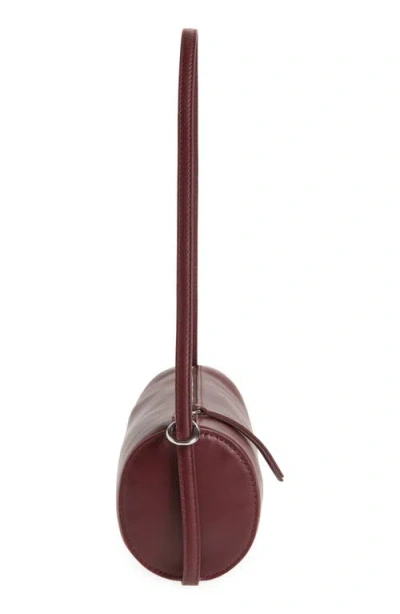 Reformation Simona Suede Cylinder Shoulder Bag In Ruby Leather