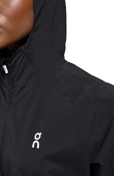 On Core Hooded Packable Running Jacket In Black