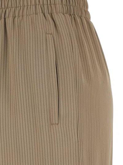 Golden Goose 'brittany' Beige Pants With Logo Charm Detail On The Rear And All-over Striped Motif In Viscose Blen In Travertine