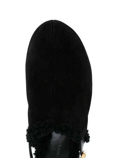 Shop Alexander Mcqueen Shearling Clogs In Black