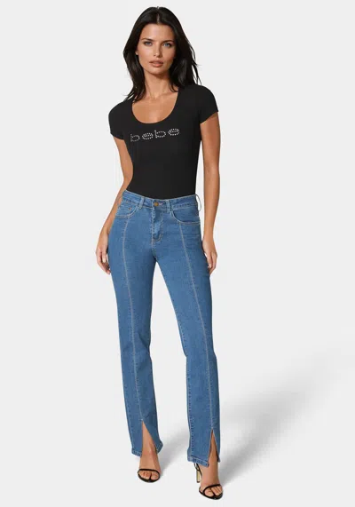 Bebe High Rise Bootleg With Hem Slit Jean In Medium Wash