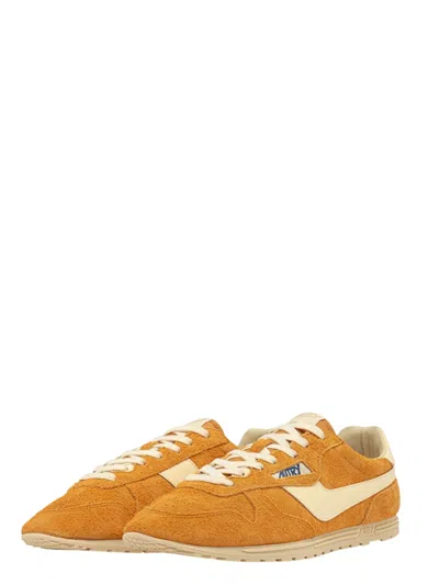Autry 'windspin Low' Yellow Sneaker With Logo On The Side And On The Heel In Orange