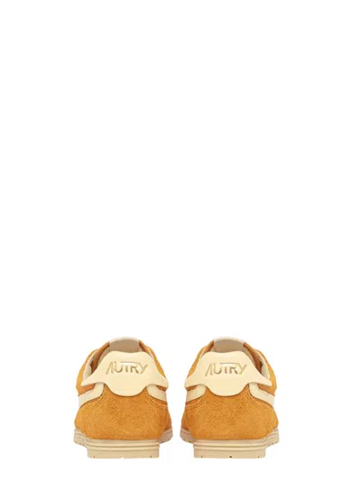 Autry 'windspin Low' Yellow Sneaker With Logo On The Side And On The Heel In Orange