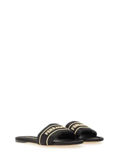 Ferragamo Logo Open Toe Flat Sole Sandal In Black