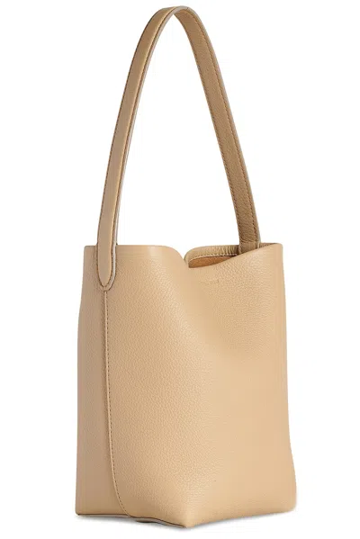 The Row Small North South Tote Bag In Brown