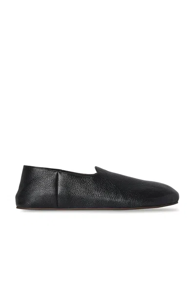 The Row Hugh Leather Slip-on Shoes In Black