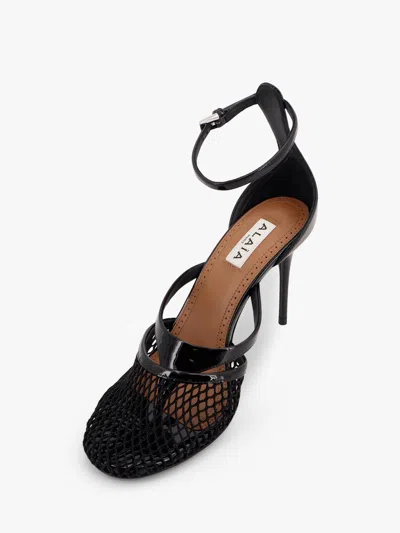 Alaïa Alaia Women Thong Sandals In Fishnet And Patent Leather In Black