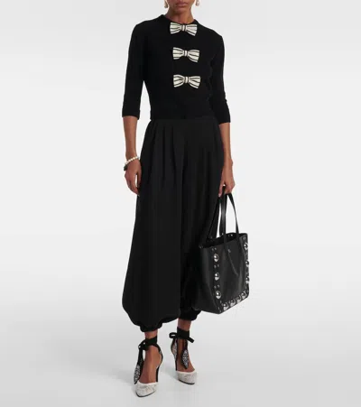 Valentino Garavani Handbags. In Black