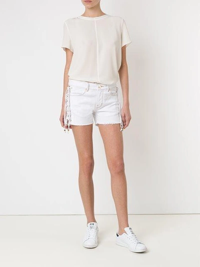Shop Amapô Denim Shorts In White