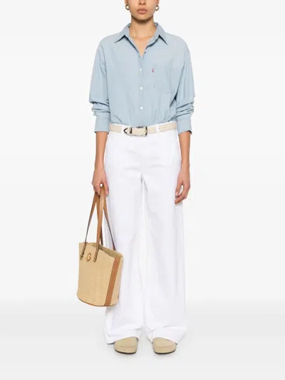 Mother The Spinner In White