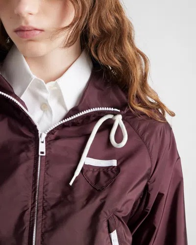 Prada Re-nylon Hooded Jacket In Garnet