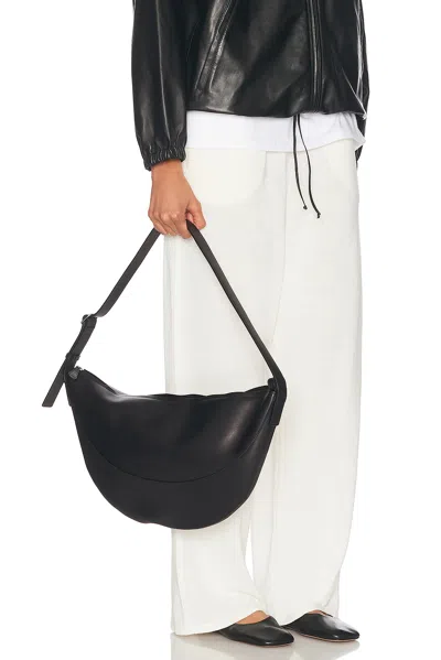 The Row Jouve Lux Fine Grain Shoulder Bag In Black