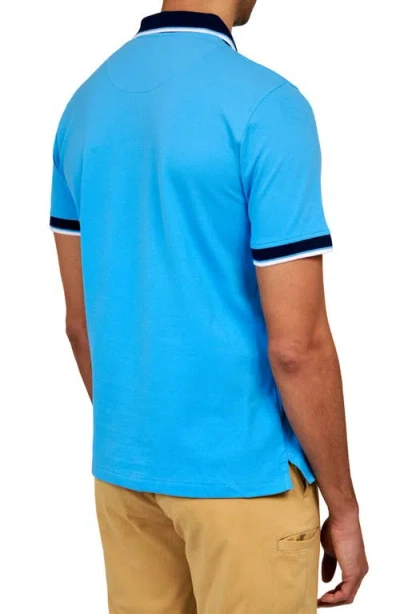 Construct Solid Pique Polo In Blue