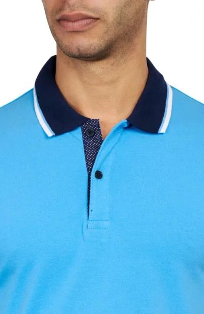 Construct Solid Pique Polo In Blue