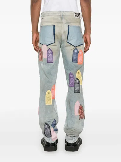 Who Decides War Patch Arched Distressed Jeans In Blue