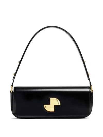 Patou Shoulder Bag With Structured Silhouette And Adjustable Strap In Schwarz