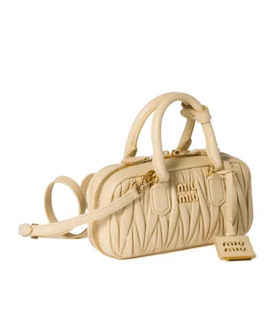 Miu Miu Zip Quilted Leather Top-handle Bag In Neutral