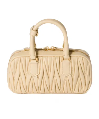Miu Miu Zip Quilted Leather Top-handle Bag In Neutral