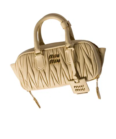 Miu Miu Zip Quilted Leather Top-handle Bag In Neutral