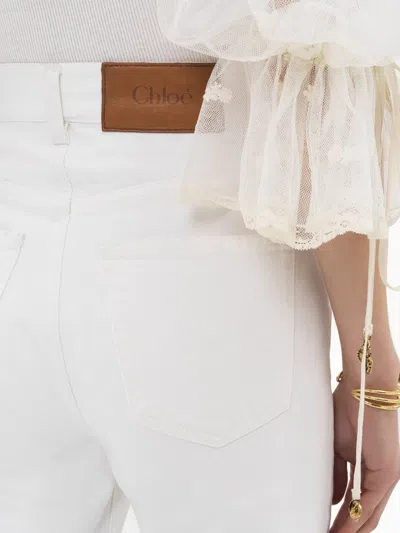 Chloé Ivory Flared Denim Trousers In White