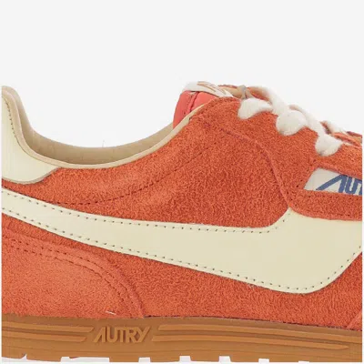 Autry Windspin Low Red Sneaker With Logo On The Side And On The Heel In Suede Man