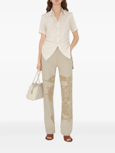 Burberry Straight Graphic Print Trousers With Rivet Detailing In Neutrals
