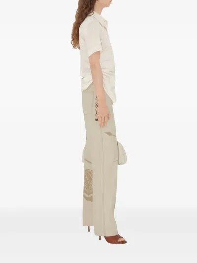 Burberry Straight Graphic Print Trousers With Rivet Detailing In Neutrals