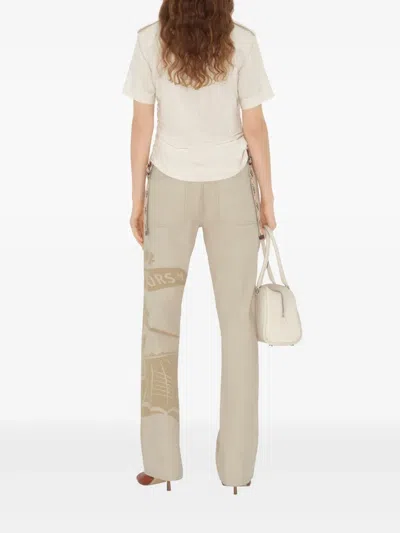 Burberry Straight Graphic Print Trousers With Rivet Detailing In Neutrals