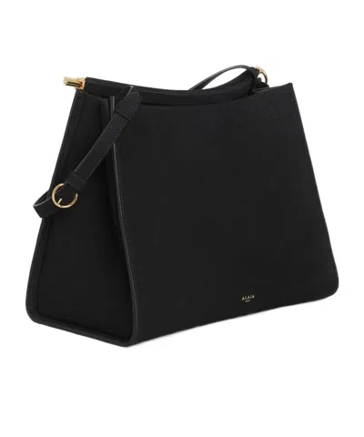 Alaïa Le Click Medium Curve Shoulder Bag In Glossy Leather In Black