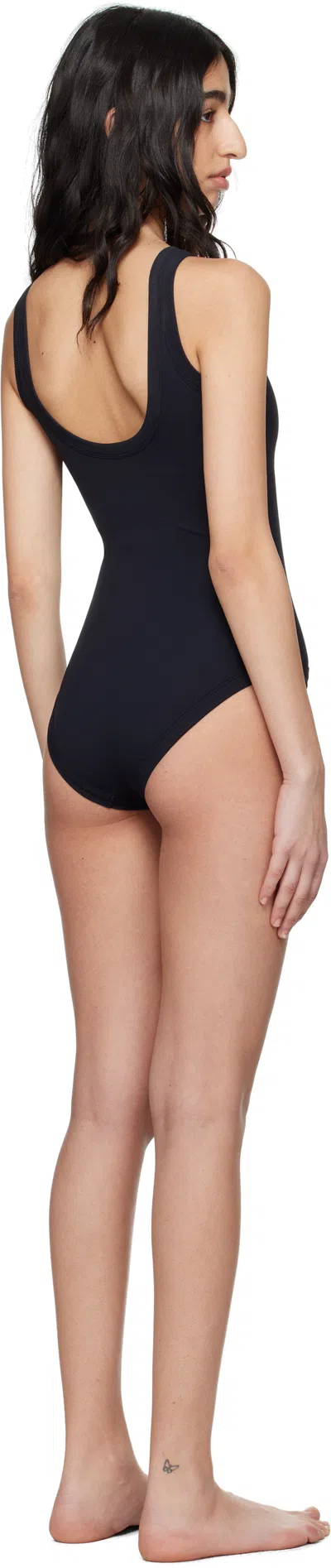 Totême Curved Ribbed-knit Jersey Swimsuit In Schwarz