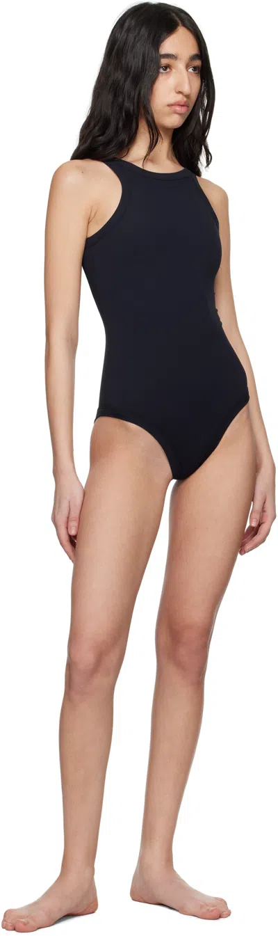 Totême Curved Ribbed-knit Jersey Swimsuit In Schwarz