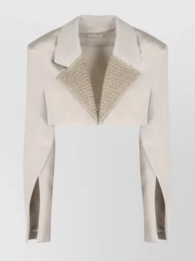 The Mannei Silk Blazer With Textured Lapel And Cropped Length