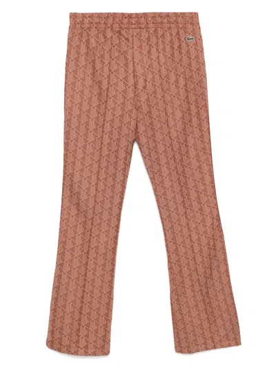 Lacoste Monogram Print Flared Trousers In Brown
