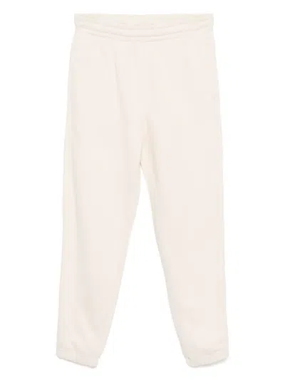 Lacoste Embossed Logo Pants In Beige