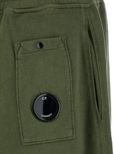 C.p. Company Green Shorts With Elastic Drawstring Waist And Logo Plaque On The Front In Green