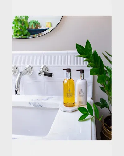 Molton Brown 10 Oz. Flora Luminare Hand Lotion