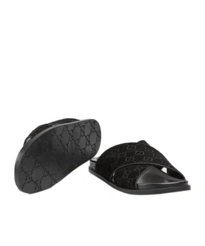 Gucci Men Leather Slides With All-over Gg Motif In Black