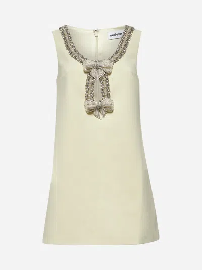 Self-portrait Yellow Crewneck Mini Dress With Jewel Embellishment On The Collar And Bow Detail On The Front In Nude
