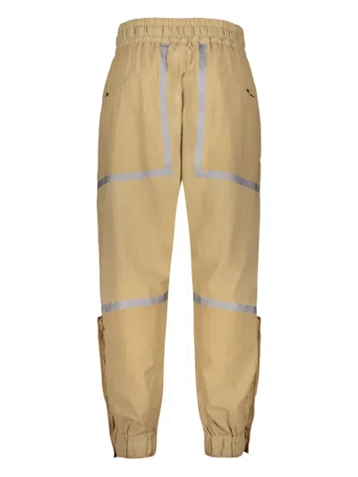 Iso.poetism Contrasting-trim Track Pants In Beige