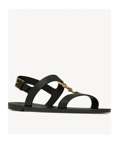 Saint Laurent Cassandra Logo Plaque Flat Sandals In Black