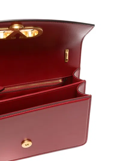 Valentino Garavani Vain Vlogo Leather Shoulder Bag In Red