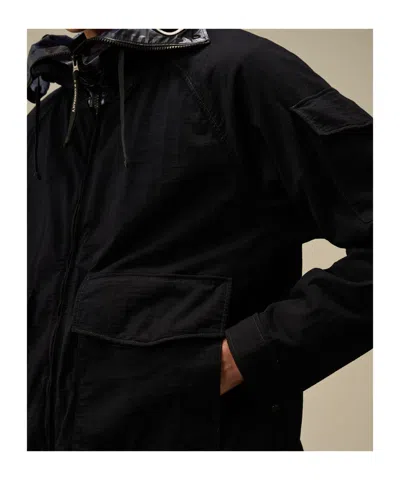C.p. Company Blue Jacket With Explorer Hood And Adjustable Drawstring Waist In Black