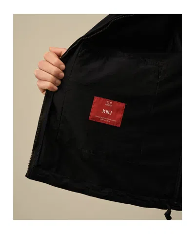 C.p. Company Blue Jacket With Explorer Hood And Adjustable Drawstring Waist In Black