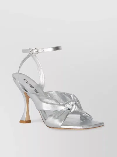 Stuart Weitzman Heeled Sandals With Knot Detail And Metallic Finish In Grey