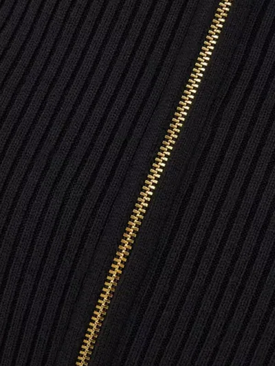 Patou Wool Skirt With Front Slit And Ribbed Texture In Black