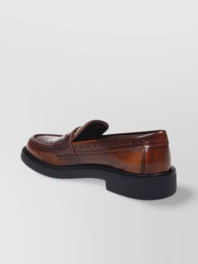 Tod's Rounded Toe Loafer With Brogue Detailing