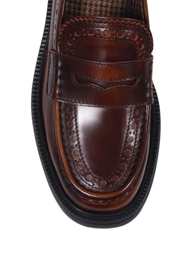Tod's Rounded Toe Loafer With Brogue Detailing