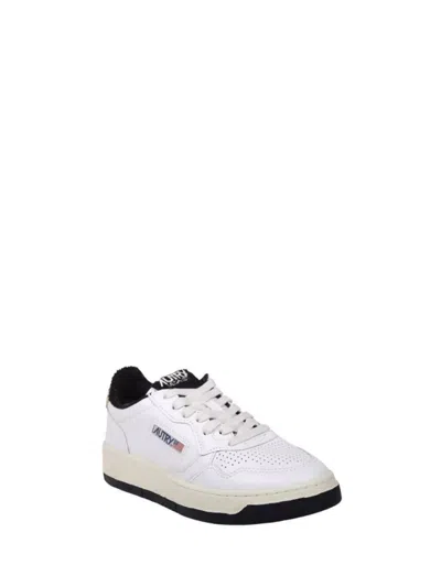 Autry Low Sneaker With Perforated Design And Rubber Sole