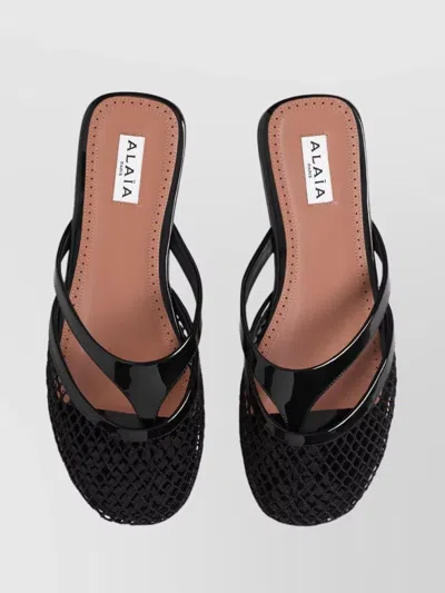 Alaïa Fishnet And Leather Flip Flops Flat Mules Shoes In Black